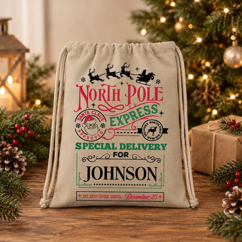 A beige drawstring bag with a Christmas-themed design, featuring text and illustrations related to the holiday season.